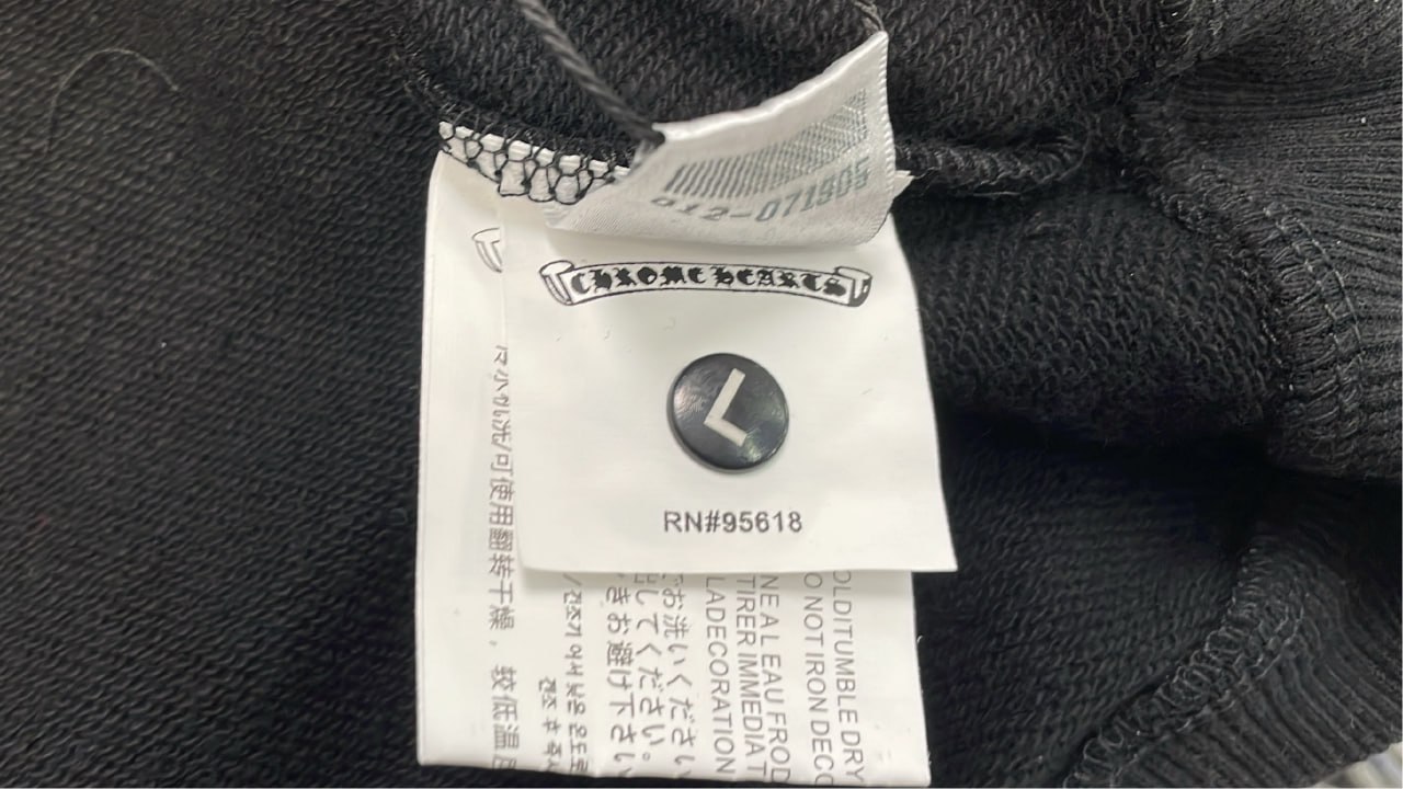 Black Zip-Up Hoodie with Embroidered Logo and Sleeve Patterns  #Black #Hoodies   -3